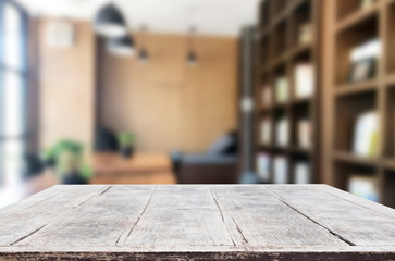 Wall Mural - Wooden board empty Table Top And Blur Interior over blur in coffee shop Background, Mock up for display of product