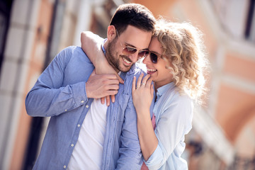 Happy young couple having fun outdoors