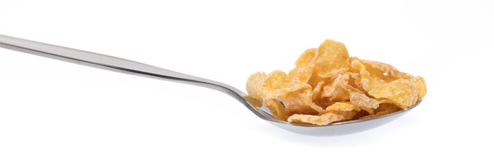 Wall Mural - Cereal on spoon isolated on white background.