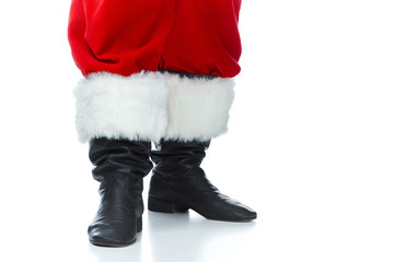 cropped view of santa claus posing in boots isolated on white