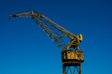 Wall Mural - Old crane in Puerto Madero neighborhood, the newest barrio (district) of Buenos Aires, Argentina