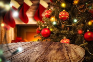 Wall Mural - table background of free space for your decoration. christmas tree with balls and fireplace backgrou