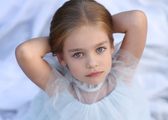 portrait of little girl outdoors in summer