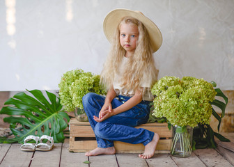 portrait of little girl outdoors in summer