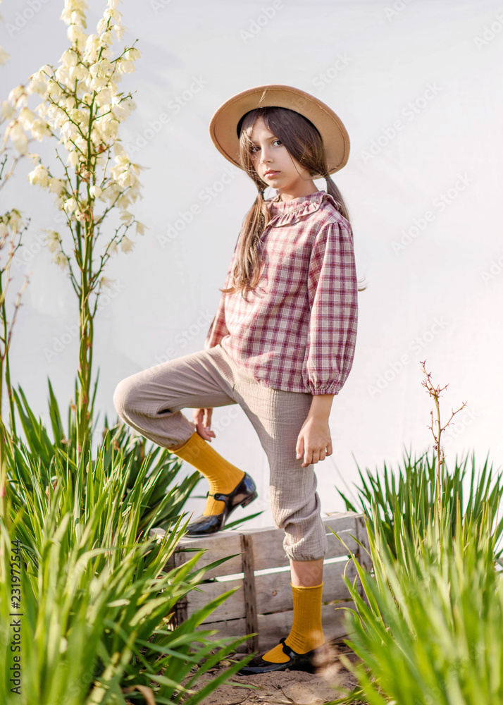 portrait of little girl outdoors in summer Stock Photo | Adobe Stock