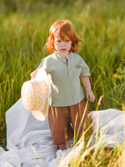 portrait of a little boy in nature