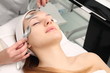 © zhagunov_a - Beautiful woman at facial massage at a spa salon.