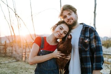 Couple volunteering at an animal sanctuary