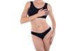 © junky_jess - Base black womens underwear on cropped female body, isolated on white.