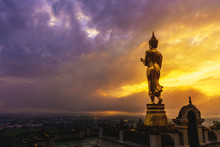 Great Golden Buddha Statue At The"Wat Phra That Kao Noi" , Nan Province, Thailand  With Sky  Twilight Time