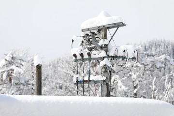 snow cover the electric pole