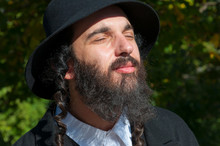 Jewish Orthodox Man With Closed Eyes Portrait.