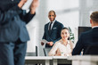 © LIGHTFIELD STUDIOS - young multiracial business colleagues working together in open space office