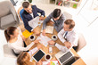 © Pixel-Shot - Meeting of business team working in office