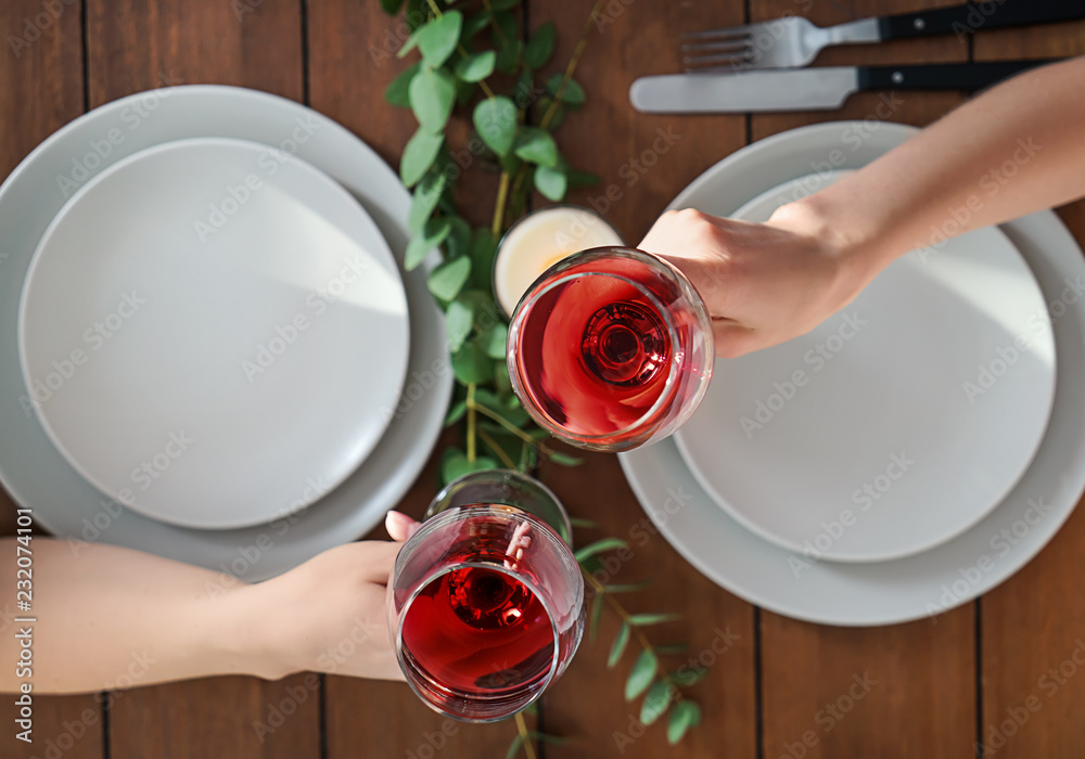 Friends drinking wine in restaurant