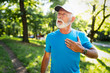 © NDABCREATIVITY - Mature man exercising outdoors to prevent cardiovascular diseases and heart attack