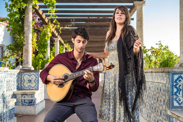 Wall Mural - Band performing traditional music fado under pergola with azulejos in Lisbon, Portugal