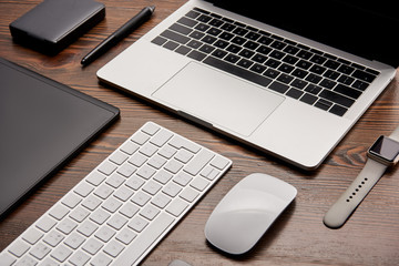 close-up shot of different wireless gadgets on graphics designer workplace