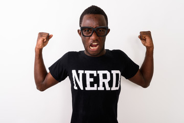 Wall Mural - Studio shot of young black African geek man wearing Nerd shirt w