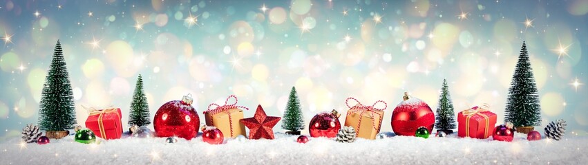 Wall Mural - christmas vintage background - gifts and tree on snow with shiny background