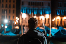Young Handsome Guy Walks Alone By Venice At Night