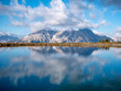 © Alex - Image of mountain panorama with water reflections in lake
