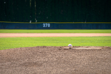 Baseball on Pitcher's Mound and 370 Yard Fence