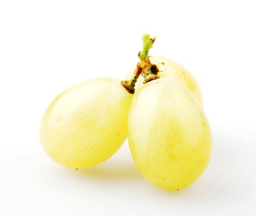 Close-Up Of Grapes Over White Background