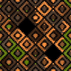 Seamless pattern Turkish carpet beige orange khaki brown black. Patchwork mosaic oriental kilim rug with traditional folk geometric ornament. Tribal style. Vector