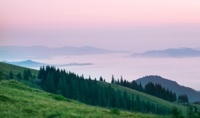 Wall Mural - pink clouds over the mountains in morning