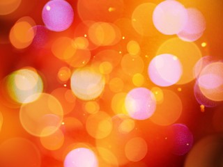 Beautiful glowing orange blurred lights glittering warm abstract with glitter effect