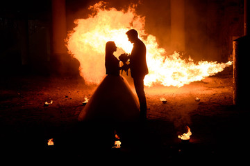 Wedding couple in medieval costumes with vampire style make-up