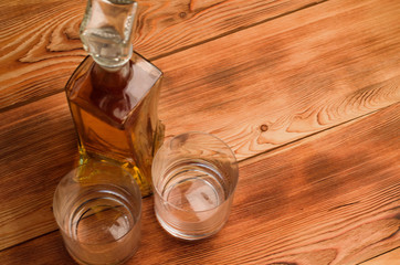 Glasses for whiskey on a wooden table