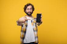 Young Crazy Mad Man  Fool Pose With A Smart Mobile Telephone