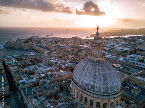 Fotografie, Obraz Aerial drone sunrise photo over Our Lady of Mount Carmel basilica