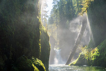 Columbia River Gorge - Hood River, Oregon. Sun Shines On Small Waterfall And Forest Stream