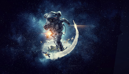 Wall Mural - Spaceman running fast. Mixed media