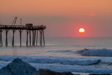 Fototapeta  - carolina beach fishing pier at sunrise
