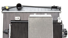 Three Different Industrial Radiator Cooling Systems On A White Background. Car Shop