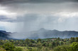 Localized rain storm pouring rain over the Ethiopian landscape.