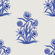 Woodblock printed indigo dye seamless ethnic floral all over pattern. Traditional oriental motif of India Mogul with bouquets of carnations, blue hues on ecru background. Textile design.