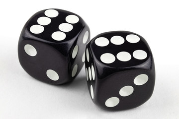 Wall Mural - Two black dice isolated on a white background. Closeup, very large. Six and six.