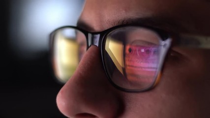 Man With Glasses Working at Night 