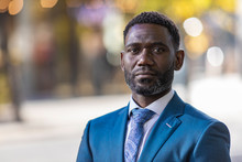 Portrait Of Handsome Mature Black Male In A Suit In The City