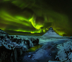 Wall Mural - Aurora borealis with Kirkjufell mountain in winter, Iceland