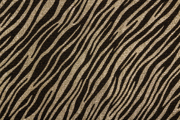  Black fabric with golden zebra pattern