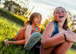 © Stocksy - Two little girls playing outdoors