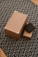Boxes On A Black And White Carpet