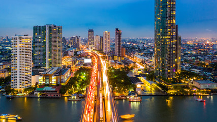 Wall Mural - Aerial view Taksin Bridge Bangkok City at sunset, Bangkok, Thailand.