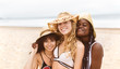© Stocksy - Three young friends on the beach
